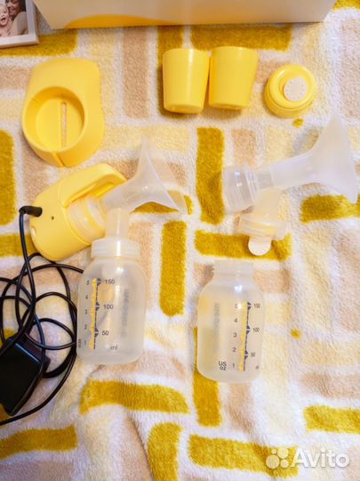 Молокоотсос medela электрический