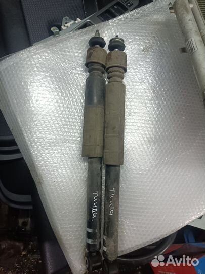 Задние амортизаторы Nissan Tiida C11