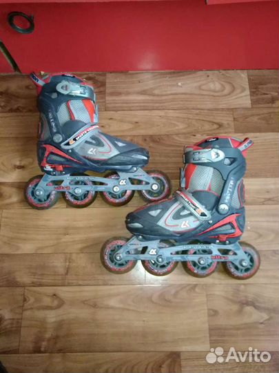Коньки роликовые