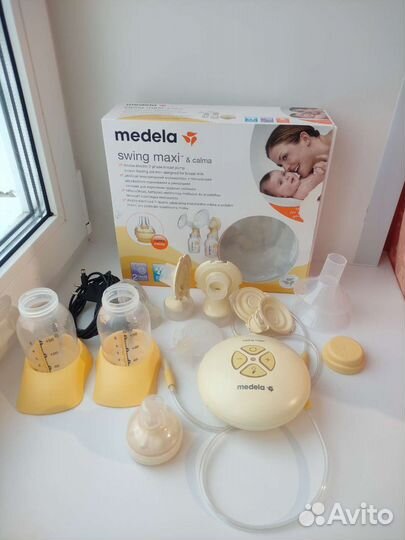 Молокоотсос Medela Swing Maxi & Calma двойной