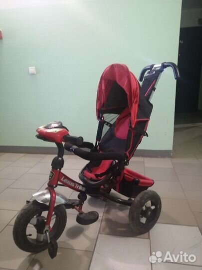 Детский трехколесный велосипед с ручкой