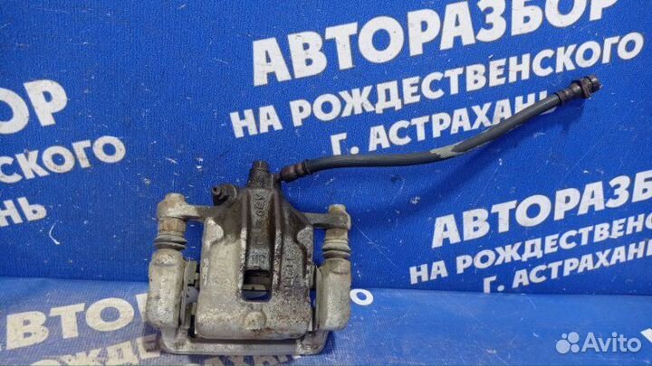 Задний левый суппорт Hyundai Elantra Hd седан G4FC