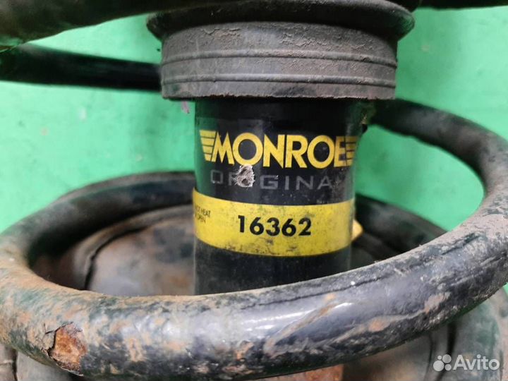 Стойка амортизатора передняя левая Hyundai Matrix