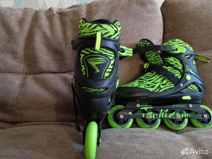 Роликовые коньки