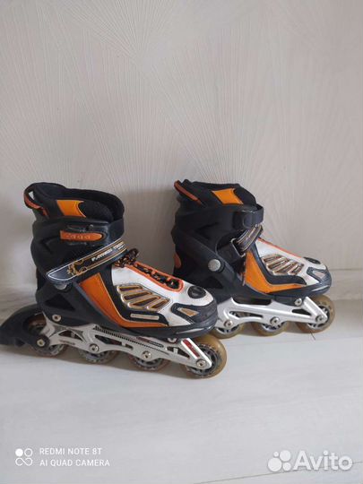 Роликовые коньки