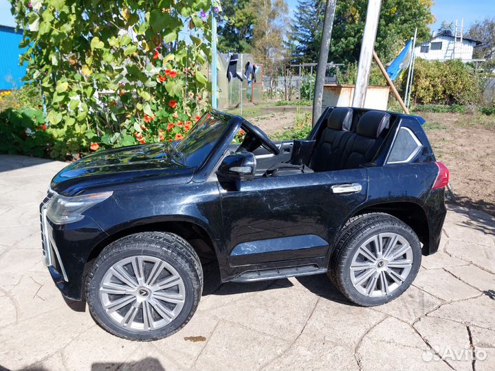 Детский электромобиль двухместный