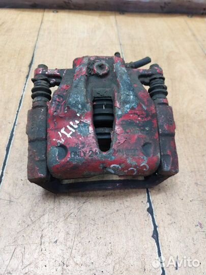 Тормозной суппорт передний левый Opel Combo Z14XEP