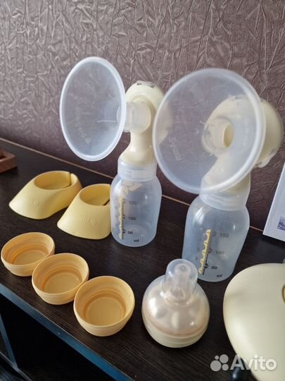 Молокоотсос medela электрический