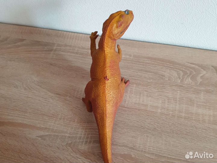 Игрушка динозавр