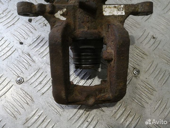 Суппорт задний левый Chevrolet Cruze