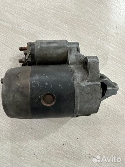 Стартер Mitsubishi Carisma 1.8 оригинал 6574