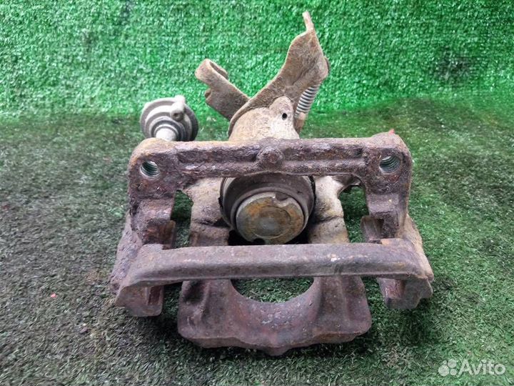 Суппорт задний левый Opel Astra J (2010-2016)