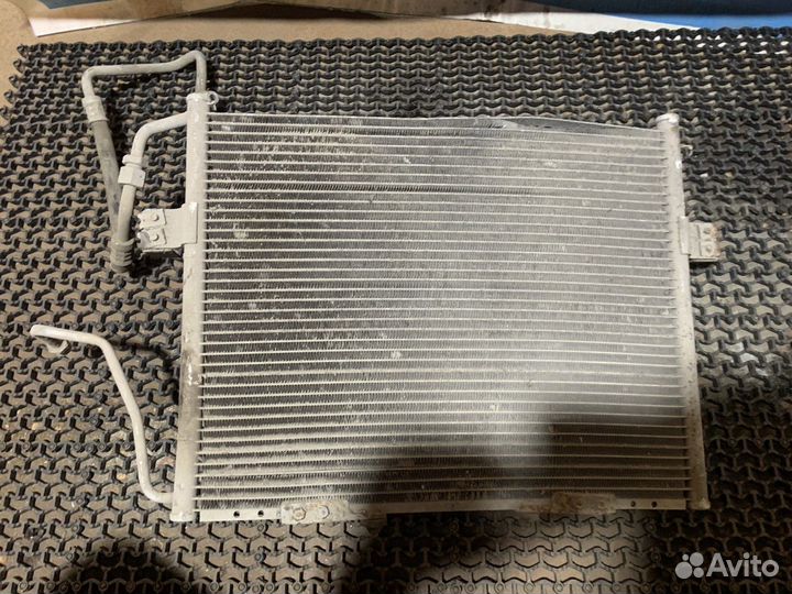 Радиатор кондиционера (конденсер) Kia Sportage