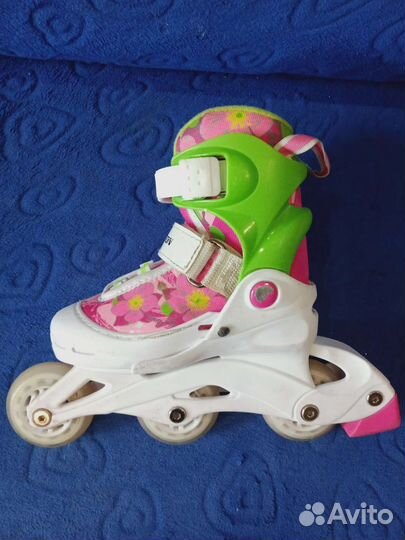 Роликовые коньки