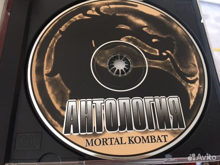 Диск и книга Mortal Kombat