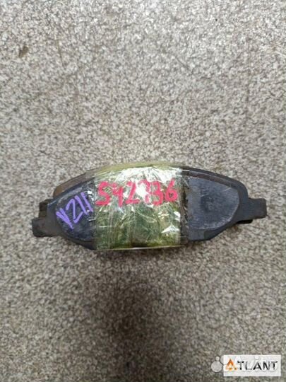 Тормозные колодки передний nissan cube