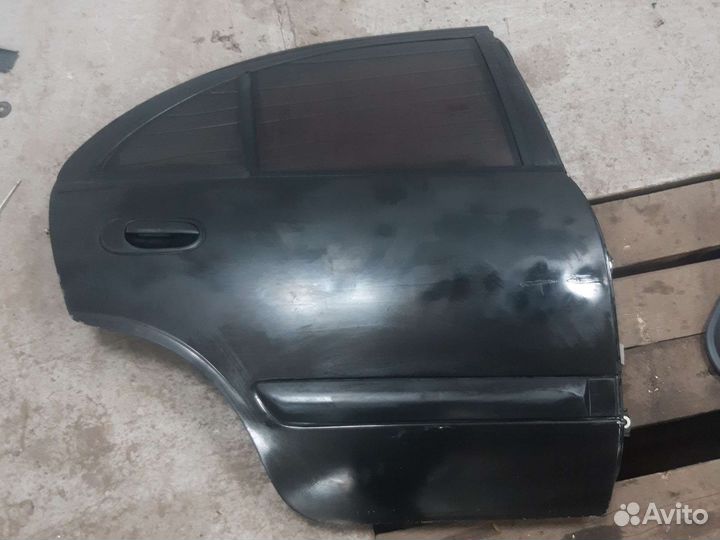 Дверь задняя правая Nissan almera n16