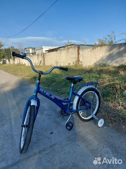 Детский Stels Talisman 18” с доп. колёсиками