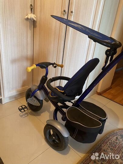 Трехколесный велосипед с ручкой