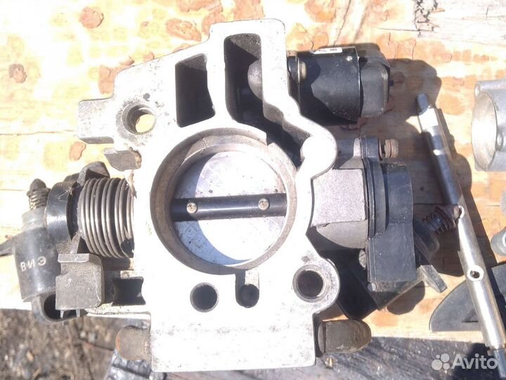 Дроссельная заслонка