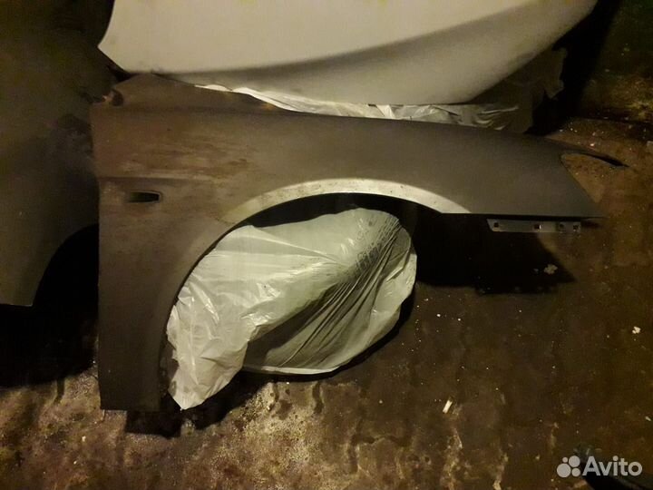 Крыло прав мицубиси лансер 10