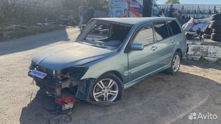 Стекло двери задней левой Mitsubishi Lancer (CS) M