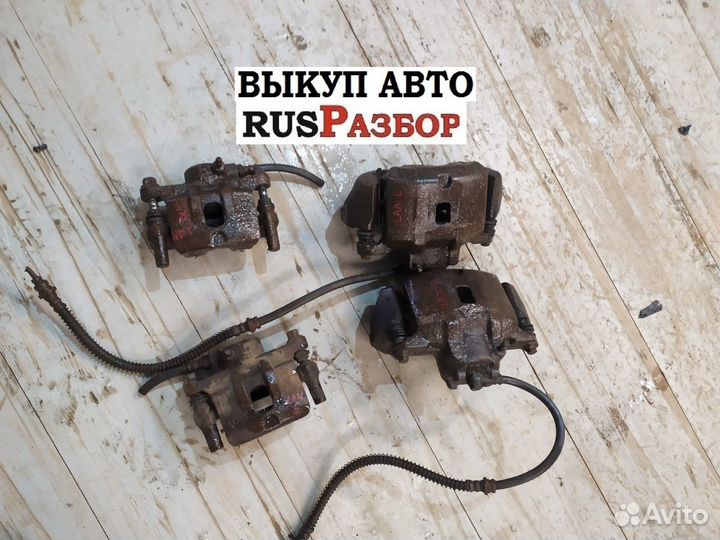 Суппорт тормозной Мицубиси Лансер 9