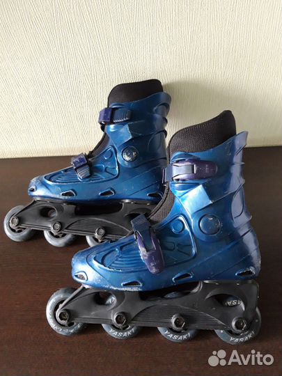 Роликовые коньки