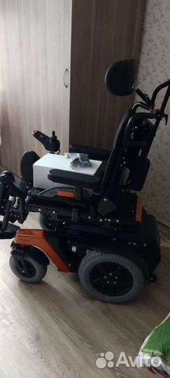 Электрическая инвалидная коляска