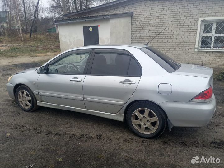 Mitsubishi Lancer 1.6 МТ, 2006, 258 000 км
