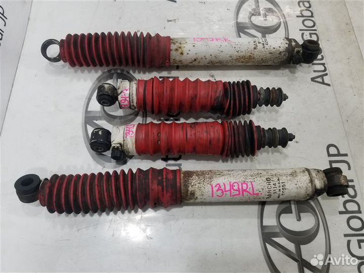 Амортизатор/стойка задняя левая Mazda Proceed Marvie