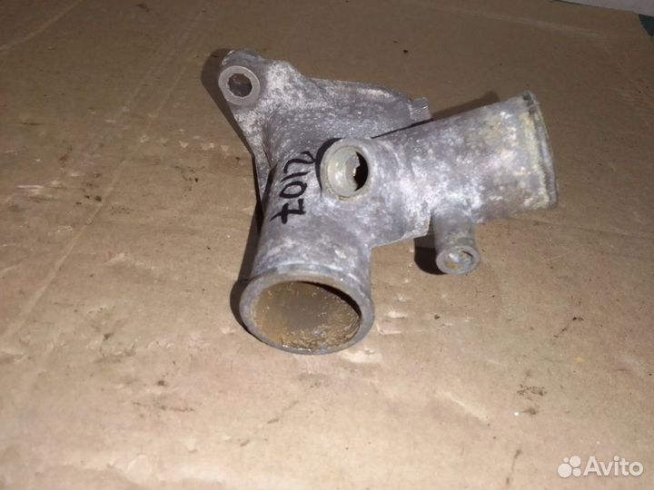 Патрубок выпускной водяного насоса Ваз 21073