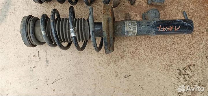 Амортизатор передний левый Opel Astra J GTC