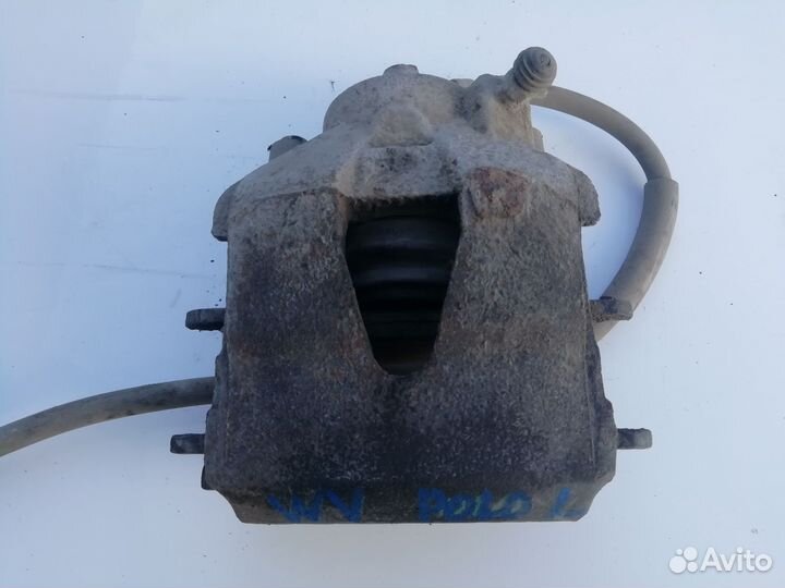 Суппорт передний левый VW Polo седан