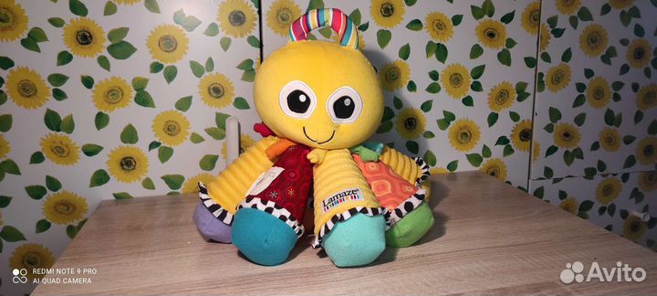 Детская игрушка музыкальная. Осьминог