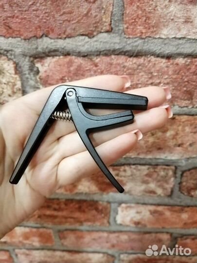 Каподастр на укулеле новый