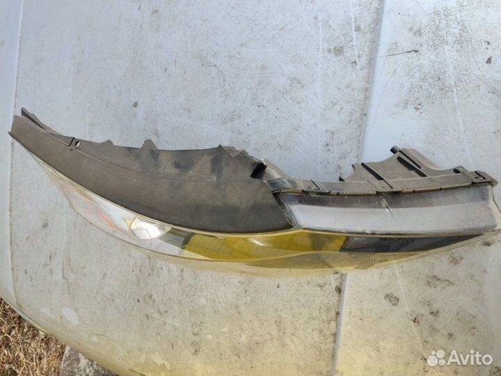 Стекло фары правое Kia Sportage 3 2011