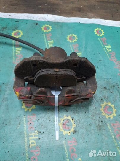 Суппорт передний левый Ford Focus 2 седан 1.8