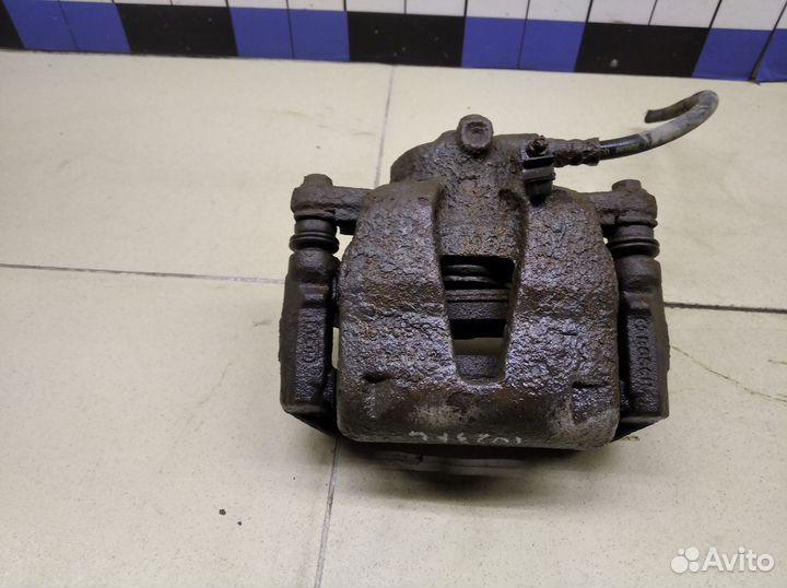 Суппорт передний левый Doblo 2005-2015