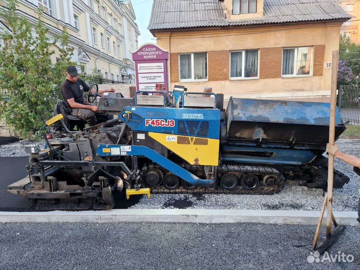 Асфальтирование дорог. двора. укладка асфальта