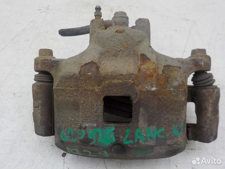 Суппорт тормозной передний правый Mitsubishi Lance