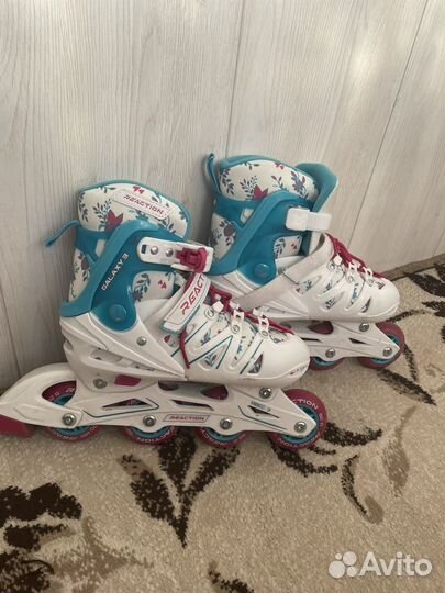 Роликовые коньки