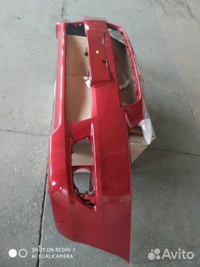 Бампер Митсубиси Лансер X новый,красный