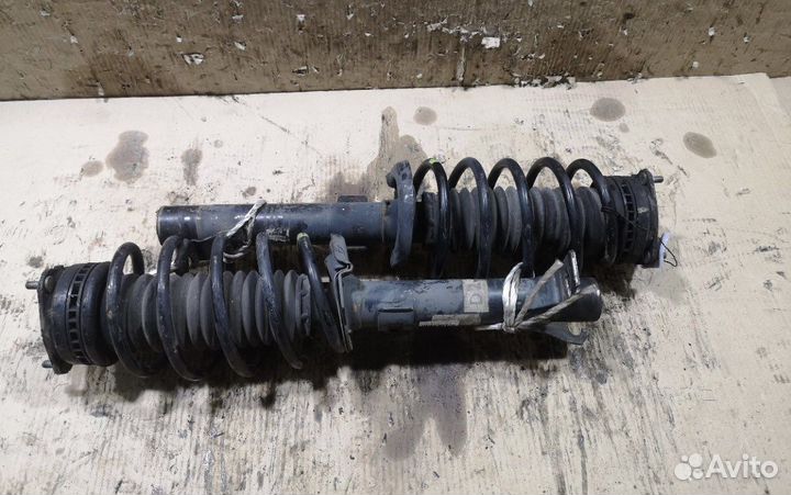 Стойки передние mazda 2 2008 год