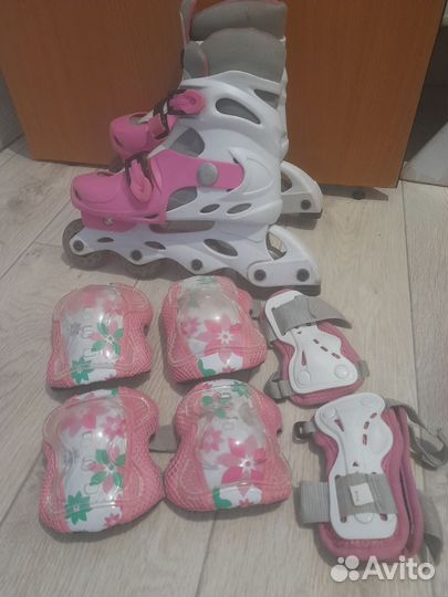 Роликовые коньки