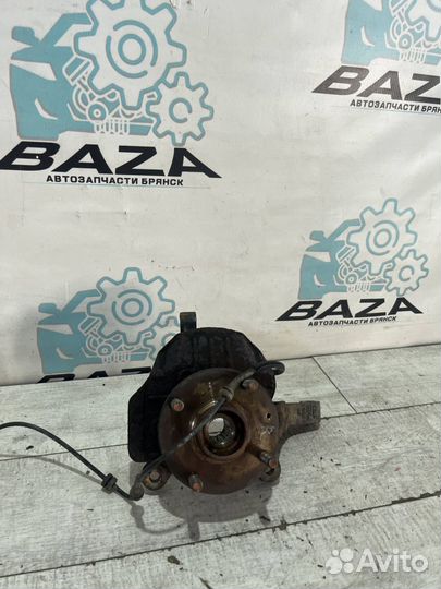 Кулак передний правый Chevrolet Lacetti