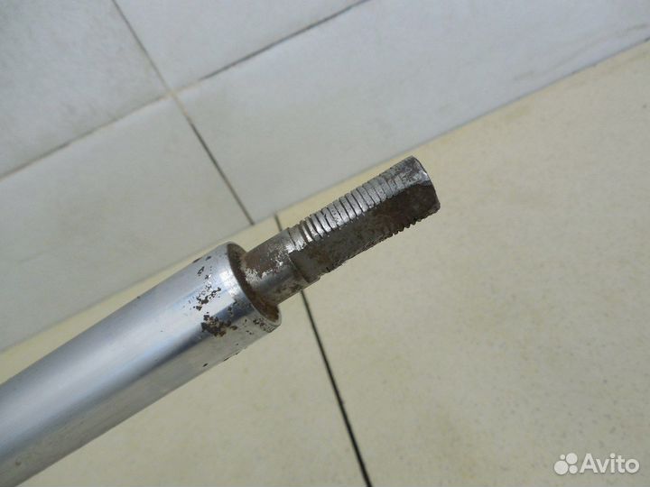 Амортизатор передний левый Almera Tino 2000-2006