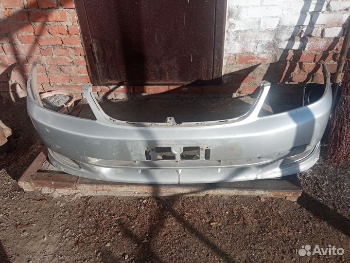 Бампер передний toyota corolla fielder 121