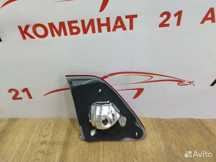 Фонарь багажника правый Toyota Corolla E 150