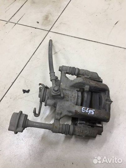 Суппорт задний правый Opel Astra